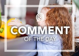 Little girl toddler grocery shopping putting yellow pepper on check out desk