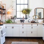 Eclectic kitchen with figural table lamp