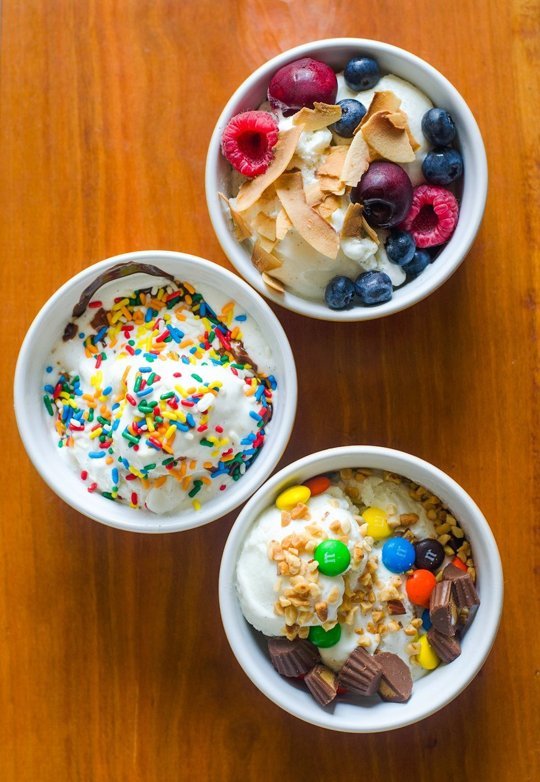 3 bowls of ice cream with toppings