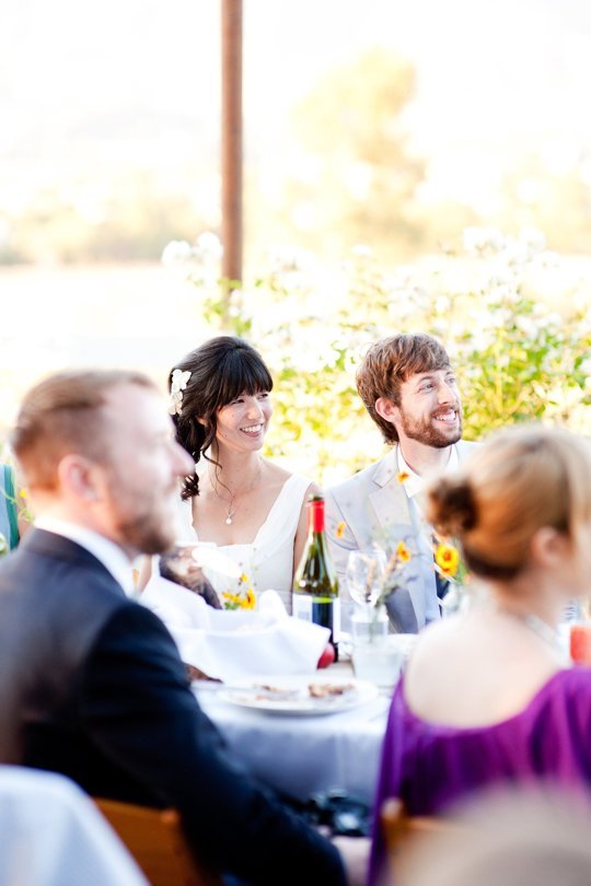 Bride and groom at wedding meal.