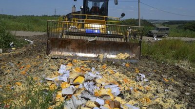 Bulldozer destroying cheese