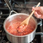 strawberries cooking in a saucepan