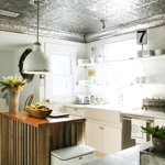 Eclectic kitchen with tin ceiling