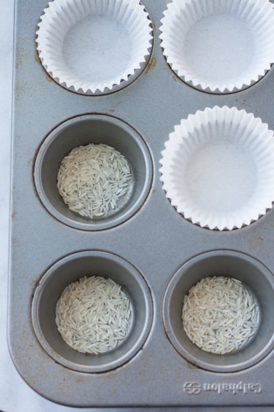 Rice at the bottom of a muffin tin