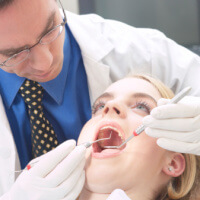 Dentist with patient