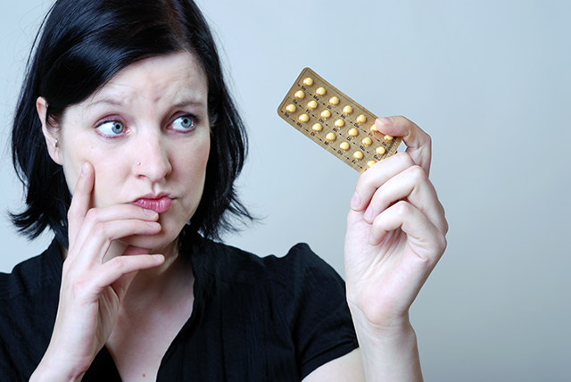 Woman-wondering-about-birth-control-pills-shutterstock_96778486-640x428