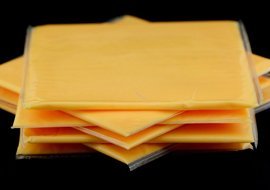 Wrapped American cheese slices.